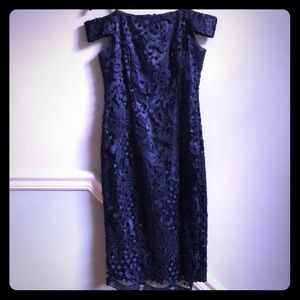 Elegant cocktail dress by Adrianna Papel.